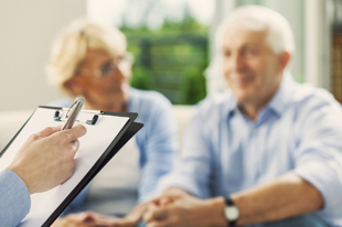 Senior couple with helpful counselor